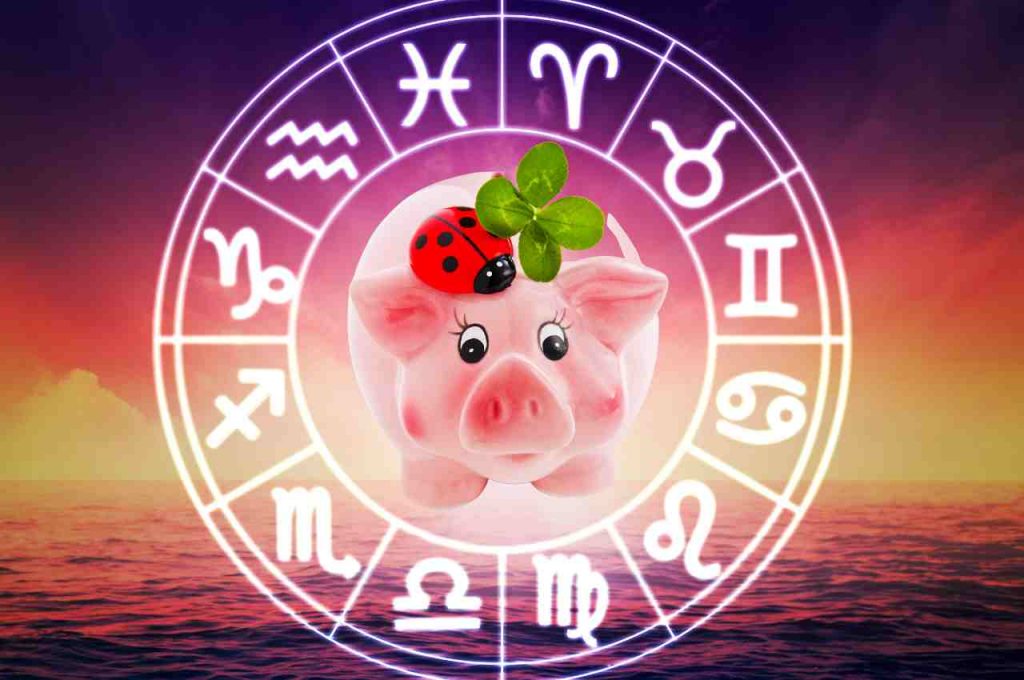 Grafica con i segni zodiacali, un maialino, una coccinella e un quadrifoglio