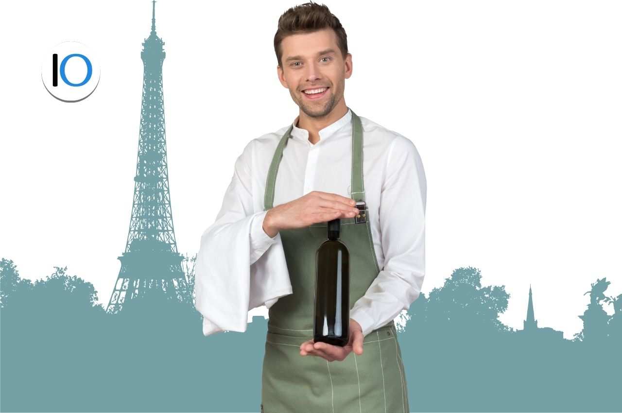 cameriere con vino e sfondo di parigi