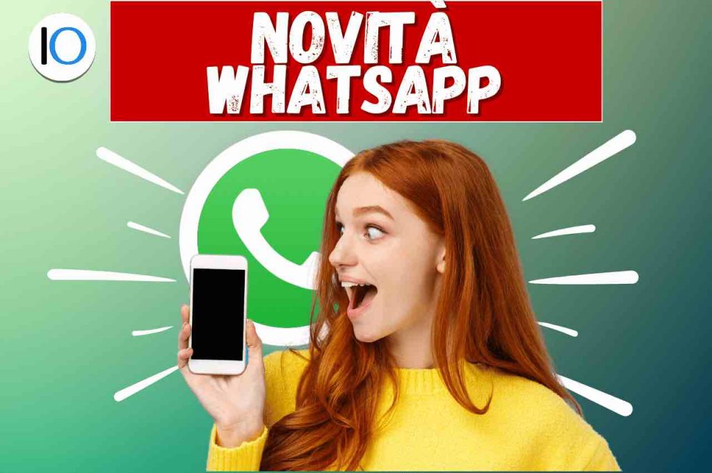 Ragazza sorpresa con smartphone, logo Whatsapp alle spalle 