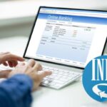 Computer con la schermata dell'home banking