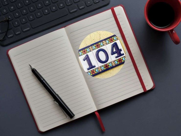 Libro con penna e logo 104