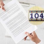 modulo tra due mani con logo legge 104