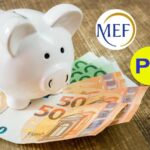 Salvadanaio a forma di maialino con soldi in euro